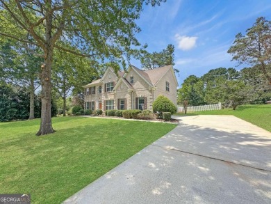 Premier Lake & Golf Living! Welcome to this beautifully on Canongate At Georgia National Golf Club in Georgia - for sale on GolfHomes.com, golf home, golf lot
