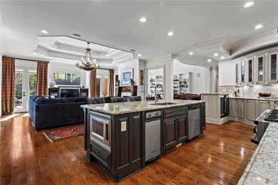 Welcome to an extraordinary six-bedroom, seven full and two on The Golf Club of Georgia in Georgia - for sale on GolfHomes.com, golf home, golf lot