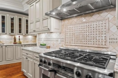 Welcome to an extraordinary six-bedroom, seven full and two on The Golf Club of Georgia in Georgia - for sale on GolfHomes.com, golf home, golf lot
