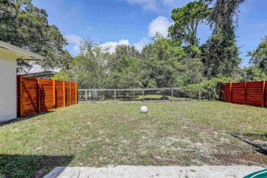 Charming 3BR/2BA concrete block home on the 8th tee of the St on St. Augustine Shores Golf Club in Florida - for sale on GolfHomes.com, golf home, golf lot