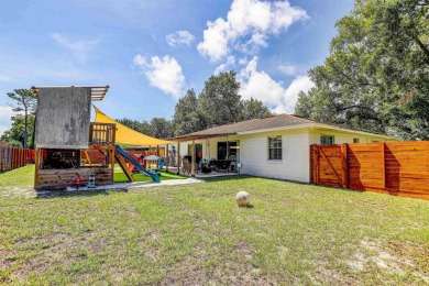 Charming 3BR/2BA concrete block home on the 8th tee of the St on St. Augustine Shores Golf Club in Florida - for sale on GolfHomes.com, golf home, golf lot