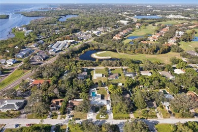 Enjoy country living in a coastal setting with this delightful on Innisbrook Resort and Golf Club in Florida - for sale on GolfHomes.com, golf home, golf lot