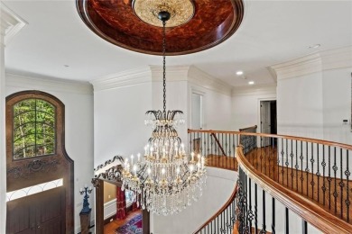 Welcome to an extraordinary six-bedroom, seven full and two on The Golf Club of Georgia in Georgia - for sale on GolfHomes.com, golf home, golf lot