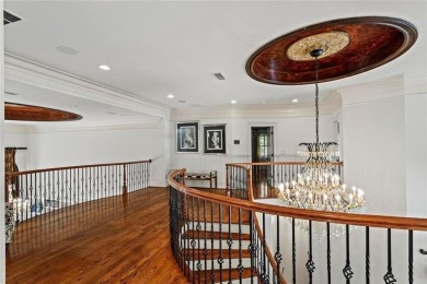 Welcome to an extraordinary six-bedroom, seven full and two on The Golf Club of Georgia in Georgia - for sale on GolfHomes.com, golf home, golf lot