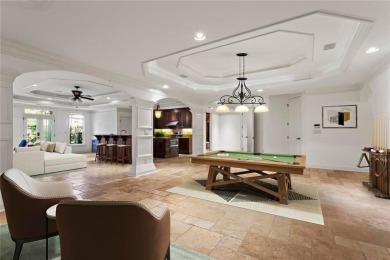 Welcome to an extraordinary six-bedroom, seven full and two on The Golf Club of Georgia in Georgia - for sale on GolfHomes.com, golf home, golf lot