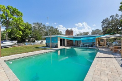 Enjoy country living in a coastal setting with this delightful on Innisbrook Resort and Golf Club in Florida - for sale on GolfHomes.com, golf home, golf lot