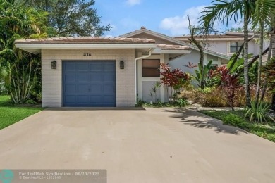 Desirable 2BR/2BA end-unit villa with expansive lake views in on Deer Creek Golf Club in Florida - for sale on GolfHomes.com, golf home, golf lot