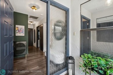 Desirable 2BR/2BA end-unit villa with expansive lake views in on Deer Creek Golf Club in Florida - for sale on GolfHomes.com, golf home, golf lot
