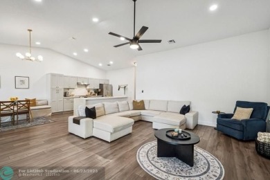 Desirable 2BR/2BA end-unit villa with expansive lake views in on Deer Creek Golf Club in Florida - for sale on GolfHomes.com, golf home, golf lot