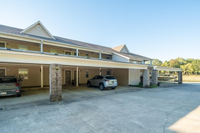 A part of the Diamondhead Community this 2/2 condo has covered on Diamondhead Golf and Country Club in Arkansas - for sale on GolfHomes.com, golf home, golf lot