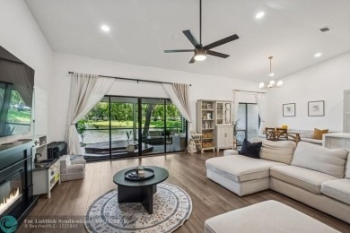 Desirable 2BR/2BA end-unit villa with expansive lake views in on Deer Creek Golf Club in Florida - for sale on GolfHomes.com, golf home, golf lot