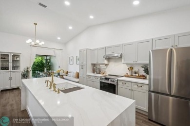 Desirable 2BR/2BA end-unit villa with expansive lake views in on Deer Creek Golf Club in Florida - for sale on GolfHomes.com, golf home, golf lot