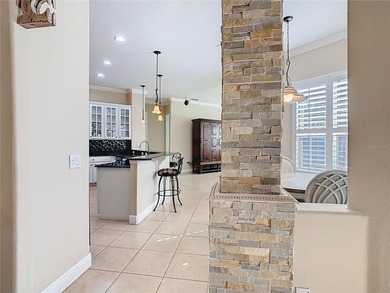 Stunning OPERETTA model on a HUGE POND in the Terra Vista on Stonegate Golf Club in Florida - for sale on GolfHomes.com, golf home, golf lot