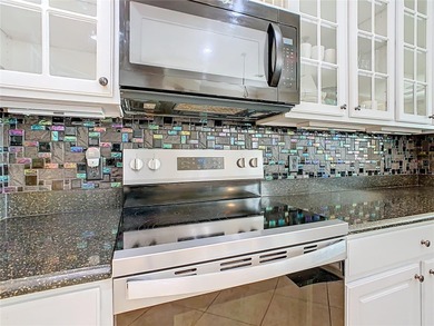 Stunning OPERETTA model on a HUGE POND in the Terra Vista on Stonegate Golf Club in Florida - for sale on GolfHomes.com, golf home, golf lot