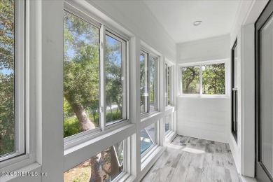GORGEOUS MARSH VIEW CUL-DE-SAC HOME IN THE GATED GOLF AND on Queens Harbour Yacht and Country Club in Florida - for sale on GolfHomes.com, golf home, golf lot