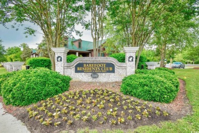 Don't miss this charming, well maintained 3 bedroom/2 bath home on Barefoot Resort and Golf Club  in South Carolina - for sale on GolfHomes.com, golf home, golf lot