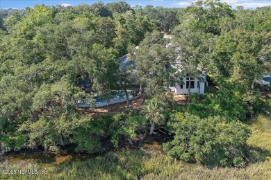 GORGEOUS MARSH VIEW CUL-DE-SAC HOME IN THE GATED GOLF AND on Queens Harbour Yacht and Country Club in Florida - for sale on GolfHomes.com, golf home, golf lot