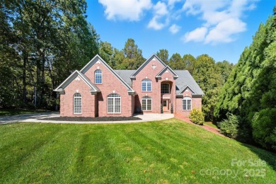 Introducing this stunning 6,000+ square feet, all brick on Rock Barn Golf and Spa in North Carolina - for sale on GolfHomes.com, golf home, golf lot