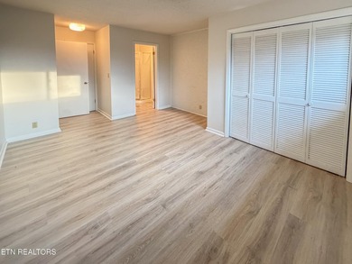 Charming 1,762 sq. ft., 2 bedroom, 3 bath condo ideally located on Lake Tansi Village Country Club in Tennessee - for sale on GolfHomes.com, golf home, golf lot