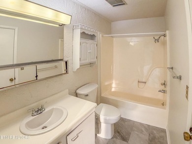 Charming 1,762 sq. ft., 2 bedroom, 3 bath condo ideally located on Lake Tansi Village Country Club in Tennessee - for sale on GolfHomes.com, golf home, golf lot