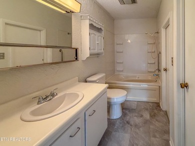 Charming 1,762 sq. ft., 2 bedroom, 3 bath condo ideally located on Lake Tansi Village Country Club in Tennessee - for sale on GolfHomes.com, golf home, golf lot