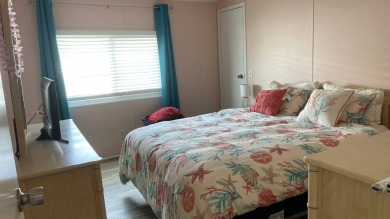 This 2 bedroom/2 bath home is 1204 sq ft. of living space, plus on Sabal Springs Golf and Racquet Club in Florida - for sale on GolfHomes.com, golf home, golf lot