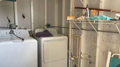 This 2 bedroom/2 bath home is 1204 sq ft. of living space, plus on Sabal Springs Golf and Racquet Club in Florida - for sale on GolfHomes.com, golf home, golf lot