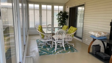 This 2 bedroom/2 bath home is 1204 sq ft. of living space, plus on Sabal Springs Golf and Racquet Club in Florida - for sale on GolfHomes.com, golf home, golf lot