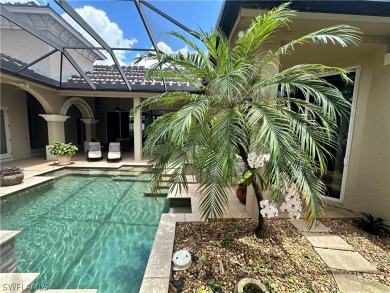 Welcome to this beautiful award winning Welch courtyard custom on The Club At Renaissance in Florida - for sale on GolfHomes.com, golf home, golf lot