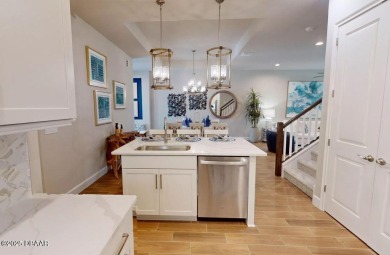 BRAND NEW PHASE! The Blossom II is a two-story townhome with 3 on Plantation Bay Golf and Country Club in Florida - for sale on GolfHomes.com, golf home, golf lot