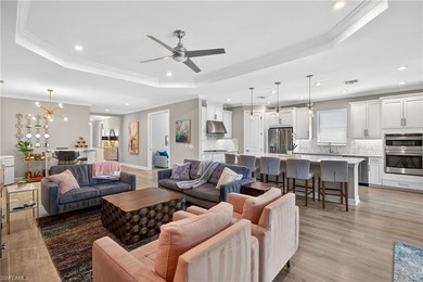 Experience luxury living in this rare 4-bedroom, 3-bath + den on Esplanade Golf and  Country Club in Florida - for sale on GolfHomes.com, golf home, golf lot