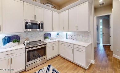 BRAND NEW PHASE! The Blossom II is a two-story townhome with 3 on Plantation Bay Golf and Country Club in Florida - for sale on GolfHomes.com, golf home, golf lot