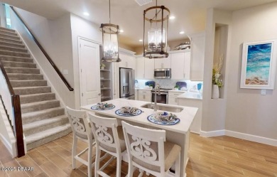 BRAND NEW PHASE! The Blossom II is a two-story townhome with 3 on Plantation Bay Golf and Country Club in Florida - for sale on GolfHomes.com, golf home, golf lot