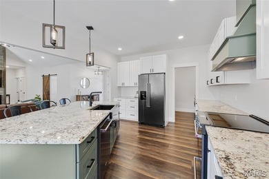 Why go on vacation when you can live at Raintree? This on Raintree Country Club in Missouri - for sale on GolfHomes.com, golf home, golf lot