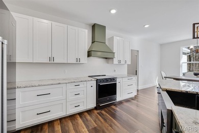 Why go on vacation when you can live at Raintree? This on Raintree Country Club in Missouri - for sale on GolfHomes.com, golf home, golf lot