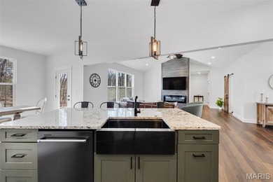 Why go on vacation when you can live at Raintree? This on Raintree Country Club in Missouri - for sale on GolfHomes.com, golf home, golf lot