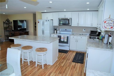 Updated and move-in ready, this residence is nestled in the on Six Lakes Country Club in Florida - for sale on GolfHomes.com, golf home, golf lot