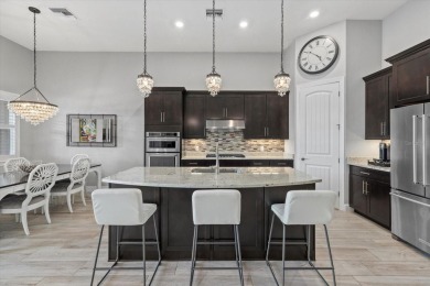 Stunning Single-Story Home on Premier Lot in Mallory Park at on Esplanade Golf and Country at Lakewood Ranch in Florida - for sale on GolfHomes.com, golf home, golf lot