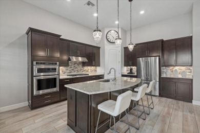 Stunning Single-Story Home on Premier Lot in Mallory Park at on Esplanade Golf and Country at Lakewood Ranch in Florida - for sale on GolfHomes.com, golf home, golf lot