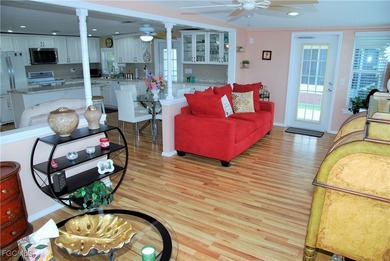 Updated and move-in ready, this residence is nestled in the on Six Lakes Country Club in Florida - for sale on GolfHomes.com, golf home, golf lot