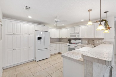 Welcome to your dream retirement haven in THE VILLAGES, Florida on The Links of Spruce Creek in Florida - for sale on GolfHomes.com, golf home, golf lot