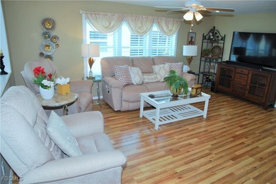 Updated and move-in ready, this residence is nestled in the on Six Lakes Country Club in Florida - for sale on GolfHomes.com, golf home, golf lot