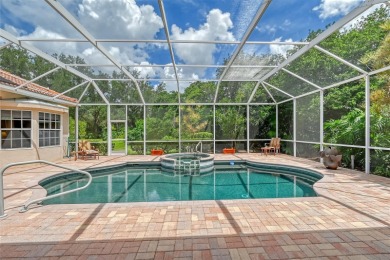 Welcome to this exquisite single-story home in University Park on University Park Country Club in Florida - for sale on GolfHomes.com, golf home, golf lot