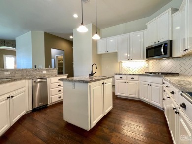 Gorgeous single-story home nestled on a tranquil cul-de-sac on The Links At Riverlakes Ranch in California - for sale on GolfHomes.com, golf home, golf lot