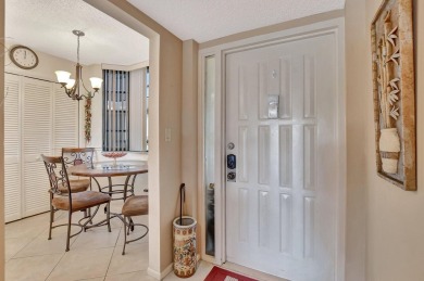 GATED COMMUNITY IN CENTRAL BOCA RATON SPACIOUS 2/2 WITH A on The Country Club At Boca Raton in Florida - for sale on GolfHomes.com, golf home, golf lot