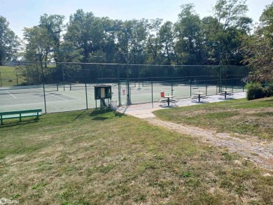 Steeped in traditional Ottumwa recreational history, picturesque on Ottumwa Country Club in Iowa - for sale on GolfHomes.com, golf home, golf lot