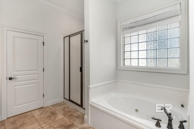 Charming cottage - style home located on #9 green on the Pine on TimberCreek Golf Club in Alabama - for sale on GolfHomes.com, golf home, golf lot