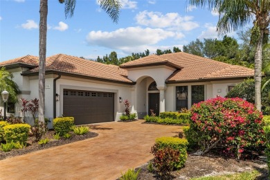 Experience this exquisite home in the sought-after gated golfing on Lakewood Ranch Golf and Country Club in Florida - for sale on GolfHomes.com, golf home, golf lot