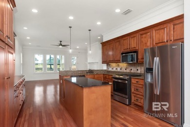 Charming cottage - style home located on #9 green on the Pine on TimberCreek Golf Club in Alabama - for sale on GolfHomes.com, golf home, golf lot