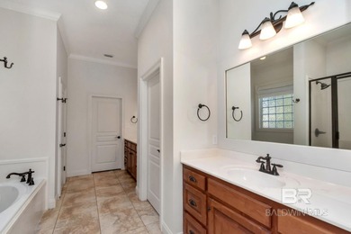 Charming cottage - style home located on #9 green on the Pine on TimberCreek Golf Club in Alabama - for sale on GolfHomes.com, golf home, golf lot